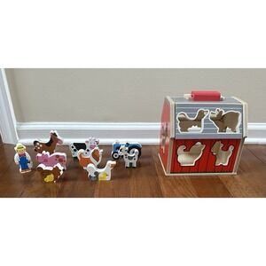 Melissa & Doug Wooden Take-Along Sorting Barn Toy with Flip-Up Roof, 9 Pieces.